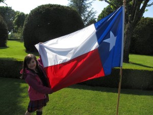 Amelia with the Texas flag