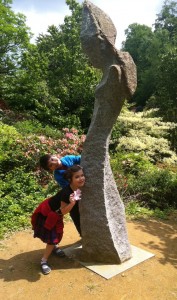 Some kids and a statue