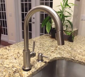 A touch-to-activate kitchen faucet