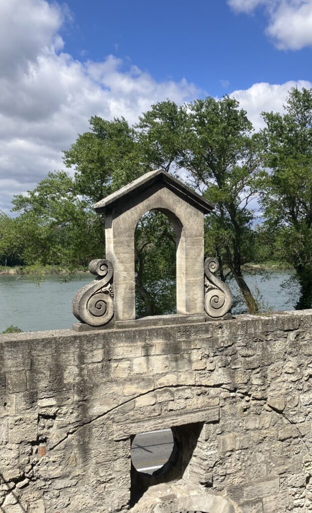 A picture of a decoration on the Pont d'Avignon, taken from atop the bridge.