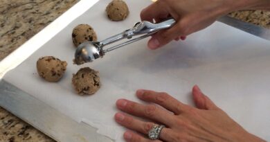 Scooping cookies with a melon baller